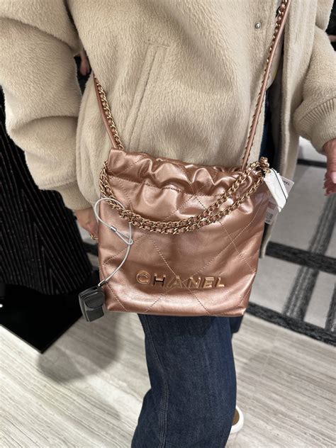 chanel 22 mini handbag price|Chanel mini flap bag with top handle.